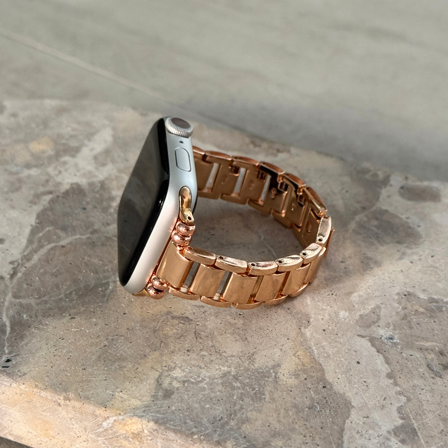 Slim and lightweight stainless steel Apple Watch band with a sleek, feminine design. Features a modern, clean aesthetic with a polished finish. Compatible with Apple Watch Series 1-10, SE, and Ultra.