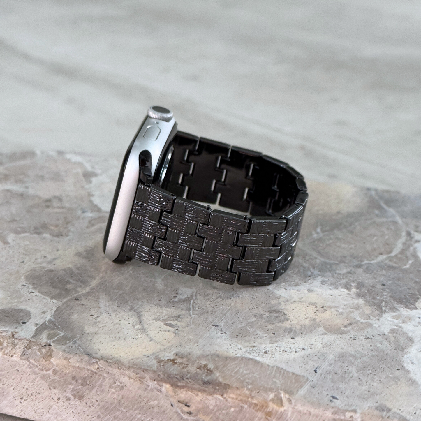 Vintage-inspired stainless steel Apple Watch band with an intricate baroque pattern. Features a mix of brushed matte and polished shine for a luxurious look. Compatible with Apple Watch Series 1-10, SE, and Ultra.