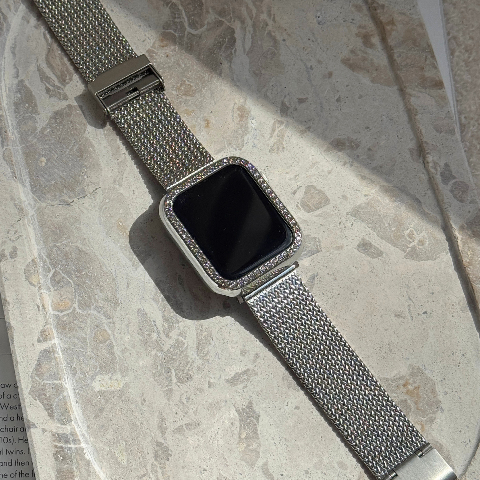 apple watch with a silver rhinestone apple watch band