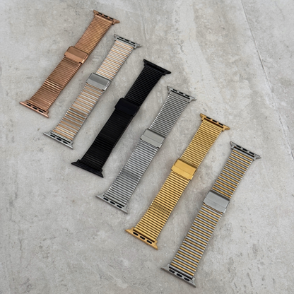 Stainless steel, waterproof Apple Watch band with a chic loop design. Features a multi-color finish and an easy-to-resize design for a perfect fit. Compatible with Apple Watch Series 1-10, SE, and Ultra.