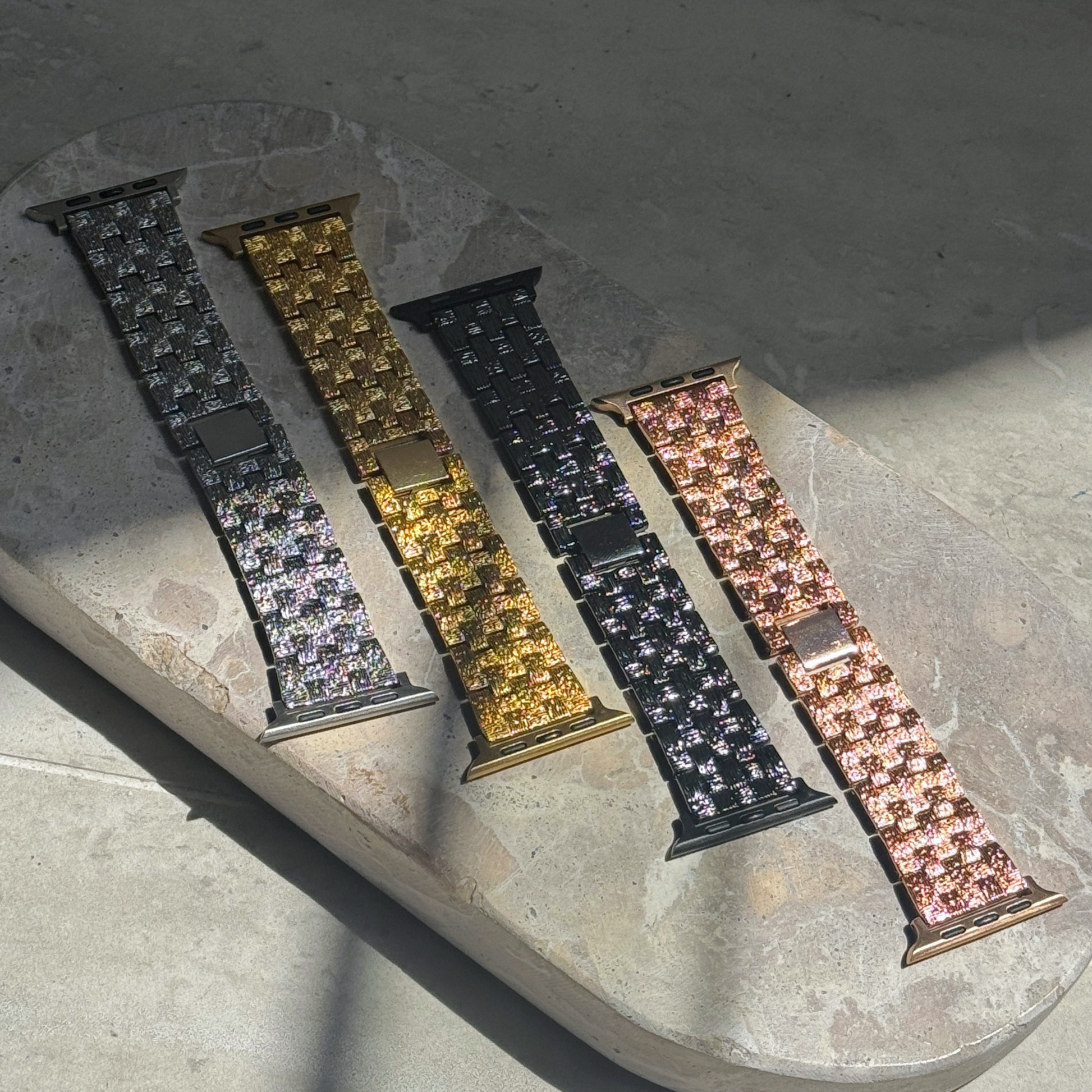 Vintage-inspired stainless steel Apple Watch band with an intricate baroque pattern. Features a mix of brushed matte and polished shine for a luxurious look. Compatible with Apple Watch Series 1-10, SE, and Ultra.