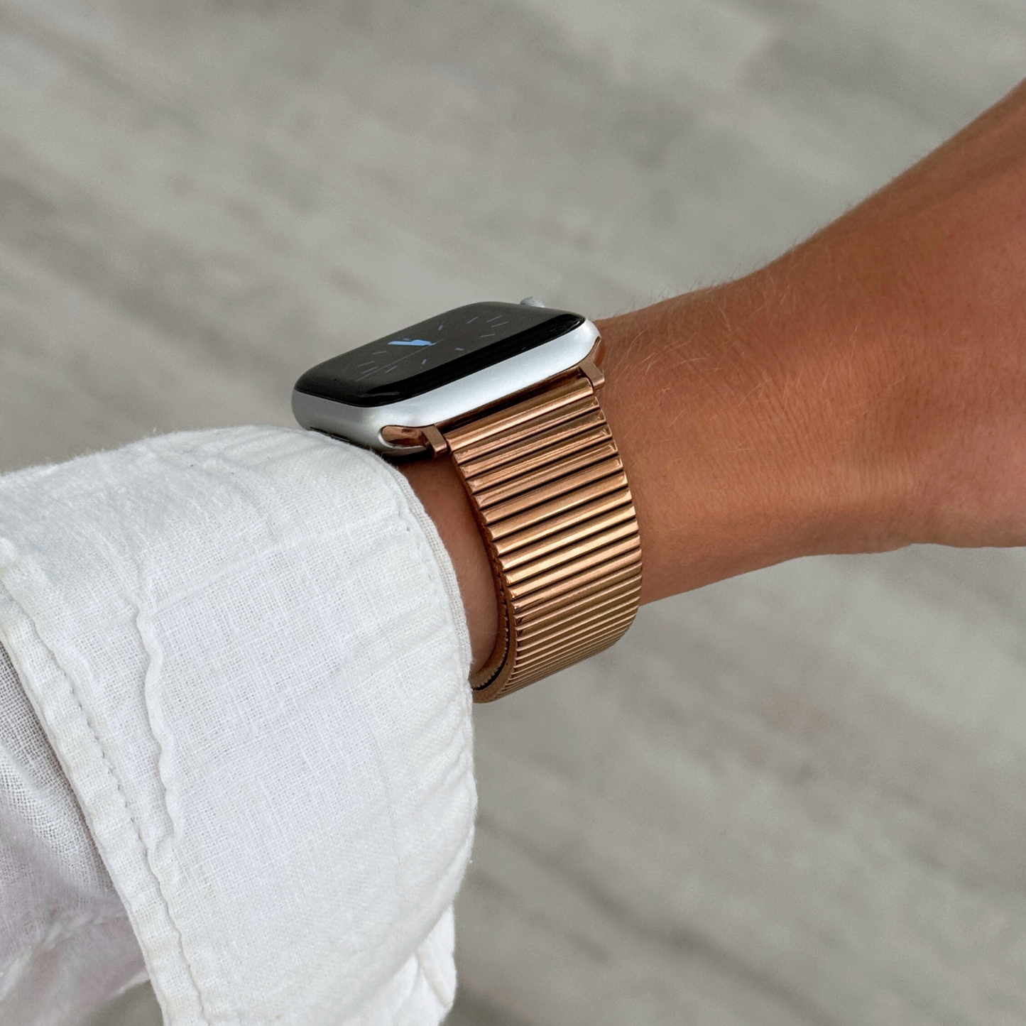 Stainless steel, waterproof Apple Watch band with a chic loop design. Features a multi-color finish and an easy-to-resize design for a perfect fit. Compatible with Apple Watch Series 1-10, SE, and Ultra.
