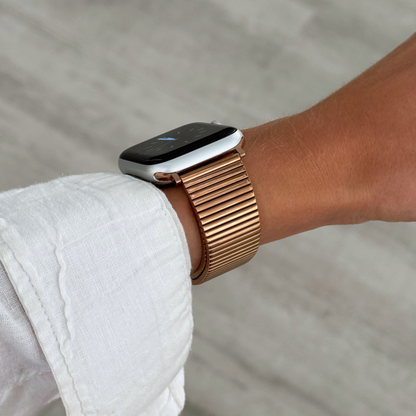 Stainless steel, waterproof Apple Watch band with a chic loop design. Features a multi-color finish and an easy-to-resize design for a perfect fit. Compatible with Apple Watch Series 1-10, SE, and Ultra.