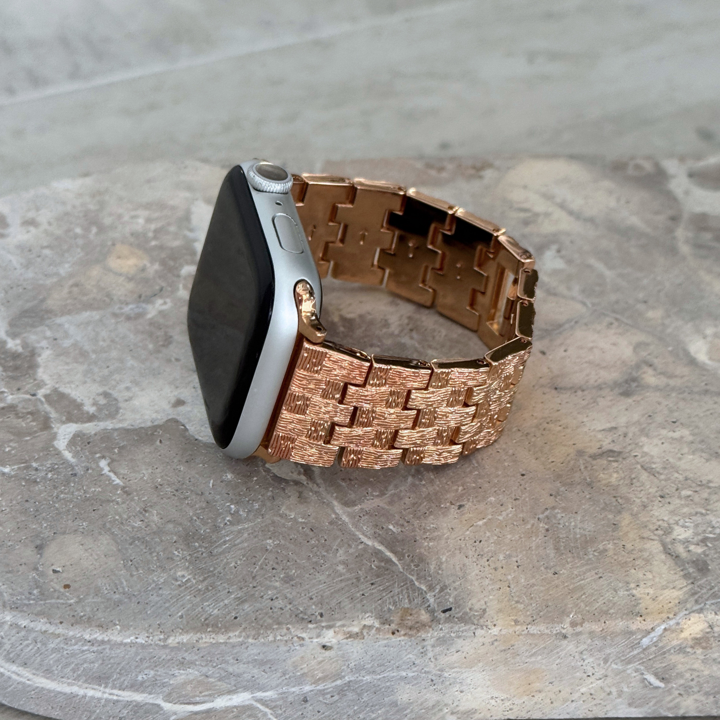Vintage-inspired stainless steel Apple Watch band with an intricate baroque pattern. Features a mix of brushed matte and polished shine for a luxurious look. Compatible with Apple Watch Series 1-10, SE, and Ultra.