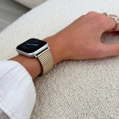 Stainless steel, waterproof Apple Watch band with a chic loop design. Features a multi-color finish and an easy-to-resize design for a perfect fit. Compatible with Apple Watch Series 1-10, SE, and Ultra.