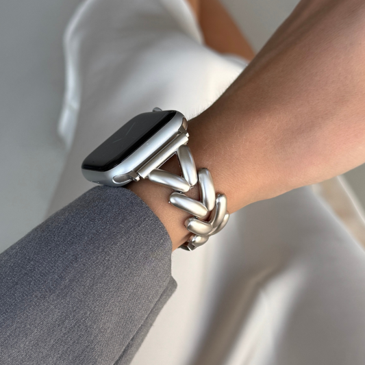 Luxurious stainless steel Apple Watch band with a unique, feminine design and a beautiful shine. Elevates any outfit with effortless elegance. Compatible with Apple Watch Series 1-10, SE, and Ultra